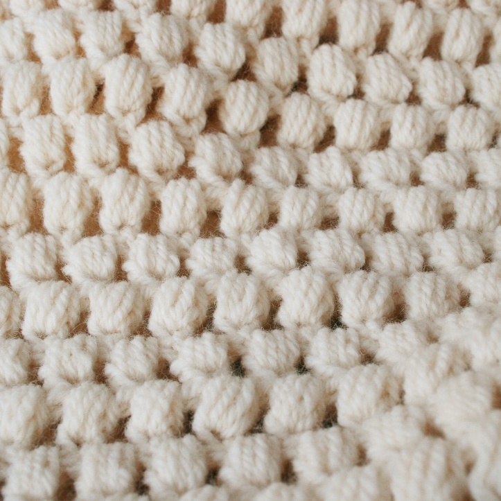 Neck rolls - rows of puff stitch